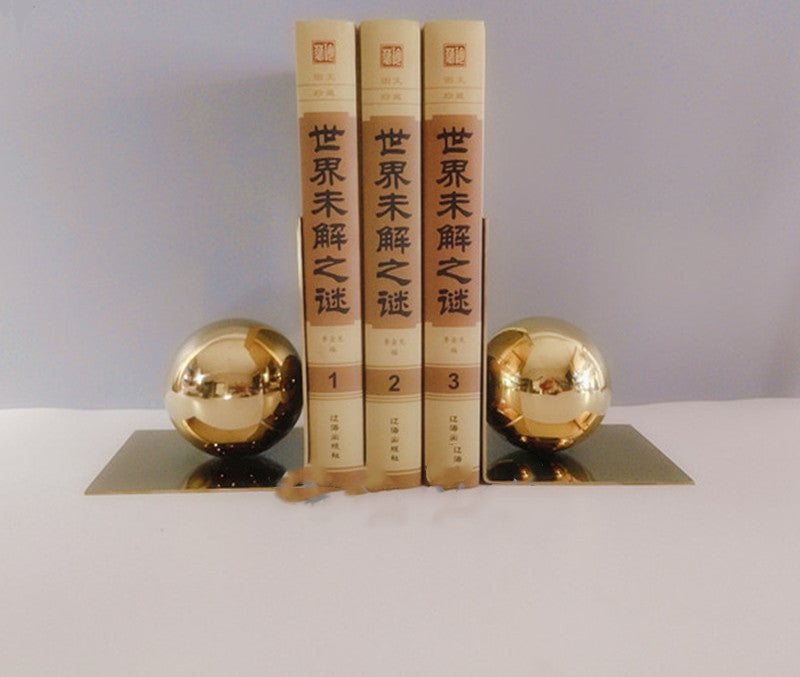 Modern Metal Ball Bookends Rely On Books