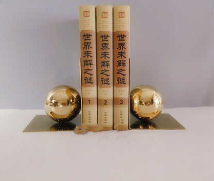 Modern Metal Ball Bookends Rely On Books