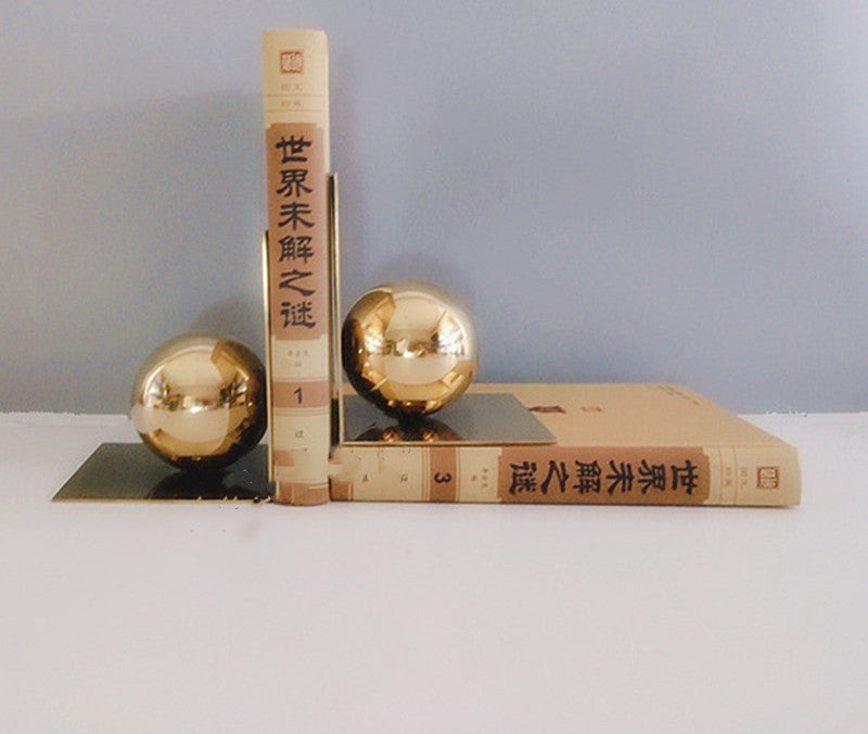 Modern Metal Ball Bookends Rely On Books